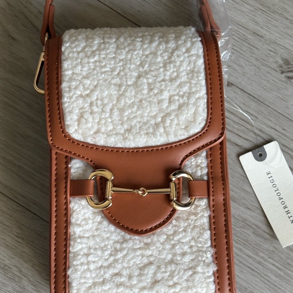 Anthropologie Sherpa Cell Crossbody Bag with a sherpa and faux leather exterior - Picture 3 of 5